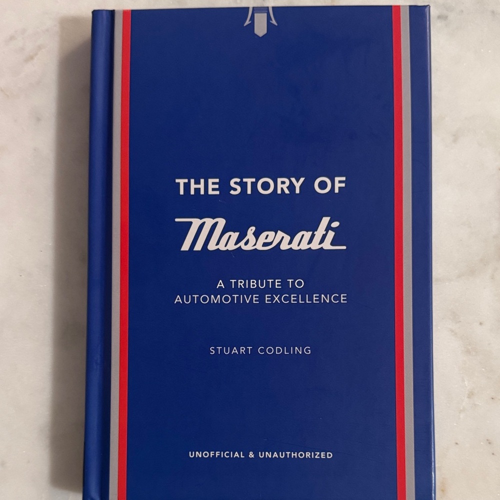 The Story of Maserati Hardcover Book - Blue with Red & White Stripes